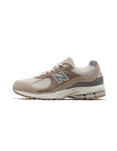 New Balance 2002R Driftwood Sandstone une grave pollution 